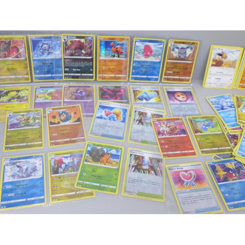 2031 - Over 270 Evolving Skies Pokémon cards including over 50 holographic in protective wallets with some ... 