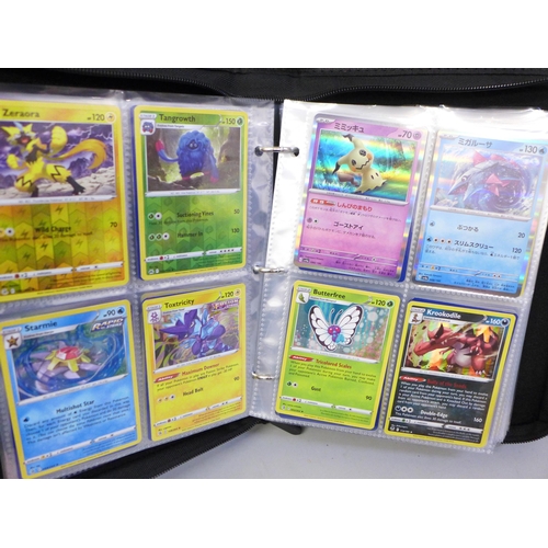 2036 - A full binder of 240 holographic Pokémon cards including rare cards