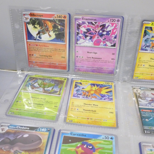 2040 - Over 500 Pokémon cards including rare cards and holographic in protective wallets