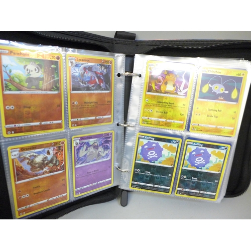 2041 - A full binder of 240 holographic Pokémon cards including rare cards