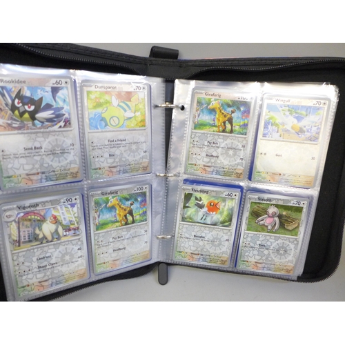 2041 - A full binder of 240 holographic Pokémon cards including rare cards