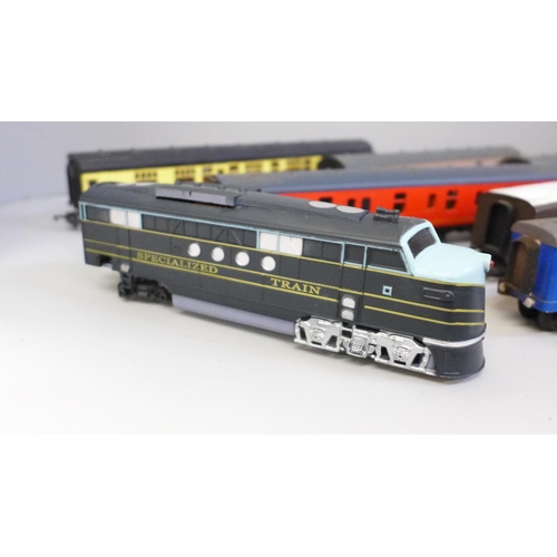 2046 - Eight OO gauge railway carriages including Hornby and Lima and a locomotive