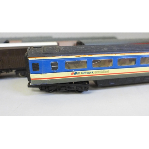 2046 - Eight OO gauge railway carriages including Hornby and Lima and a locomotive