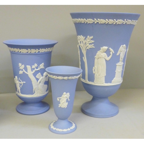 2048 - A collection of Wedgwood Jasperware, five vases and a planter