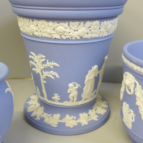 2048 - A collection of Wedgwood Jasperware, five vases and a planter