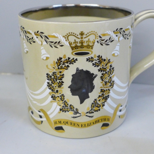 2054 - A Wedgwood commemorative mug, Queen Elizabeth Silver Jubilee, a Caverswall two handled cup, a Royal ... 