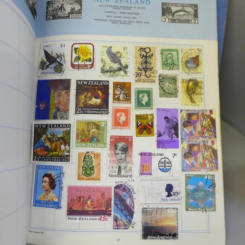 2056 - A collection of stamp albums containing worldwide stamps, commemorative crowns and a Days Gone model... 