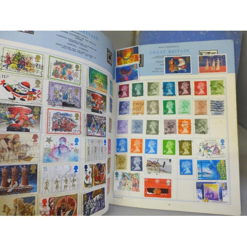 2056 - A collection of stamp albums containing worldwide stamps, commemorative crowns and a Days Gone model... 