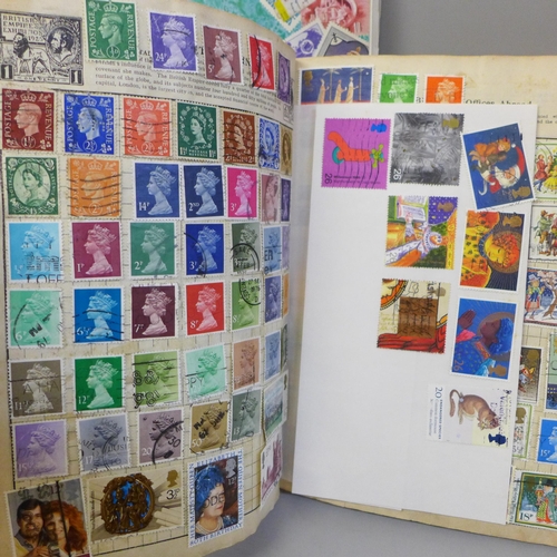 2056 - A collection of stamp albums containing worldwide stamps, commemorative crowns and a Days Gone model... 