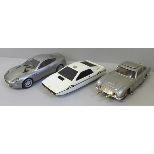 2057 - A collection of Corgi die-cast vehicles including two James Bond 007 cars and a Chevrolet, four heli... 