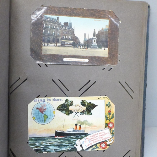 2064A - Postcards; a vintage postcard album and contents, 98 cards