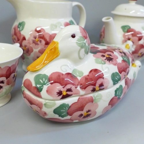 2069 - A collection of Emma Bridgewater pottery, a large teapot, large cup, hen egg basket with lid and a l... 