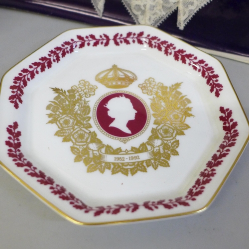 2075 - A Royal Doulton figure of Queen Elizabeth II to commemorate her 80th birthday, a Wedgwood plate comm... 