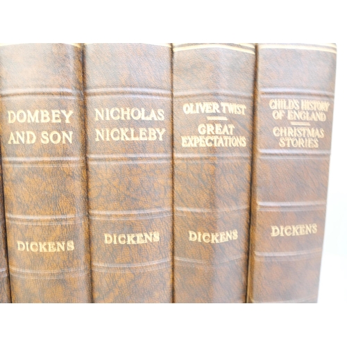 2124 - A collection of Charles Dickens books including Great Expectations and David Copperfield, hand writt... 