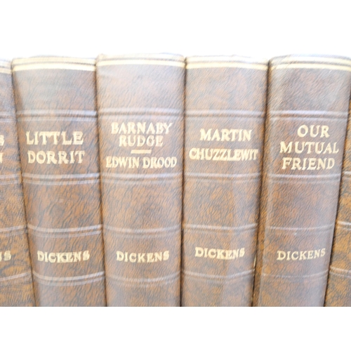 2124 - A collection of Charles Dickens books including Great Expectations and David Copperfield, hand writt... 