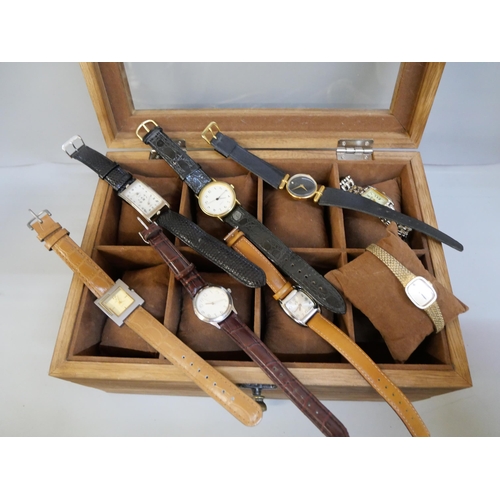 2131 - A collection of wristwatches including Swatch, together with a wooden watch display box