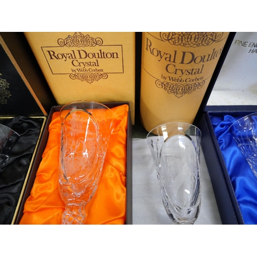 2148 - A collection of Webb Corbett and Royal Doulton commemorative crystal goblets, boxed