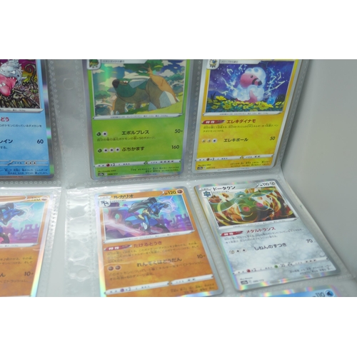 2190 - 69 Japanese holographic Pokémon cards in protective sleeves