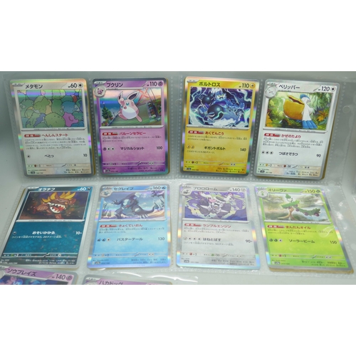 2190 - 69 Japanese holographic Pokémon cards in protective sleeves