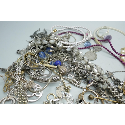 2210 - A collection of white metal and plated jewellery