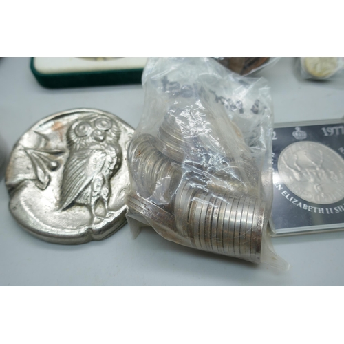 2217 - A large collection of British and foreign coins, commemorative coins, football medallions, etc.