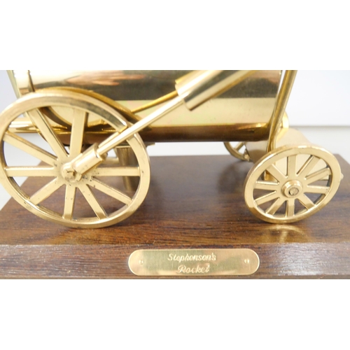 2223 - A brass model of Stephenson's Rocket on a wooden plinth