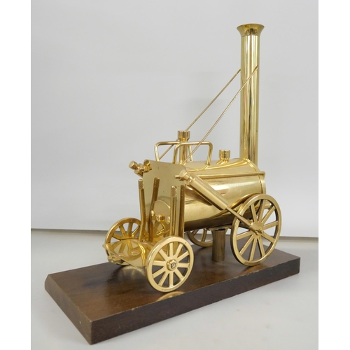 2223 - A brass model of Stephenson's Rocket on a wooden plinth