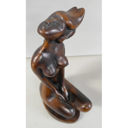 2226 - A resin sculpture of a stylised nude, 24cm