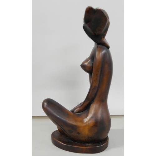 2226 - A resin sculpture of a stylised nude, 24cm