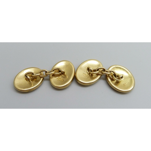 7013 - A pair of 18ct gold cufflinks with engraved monograms, 8.5g