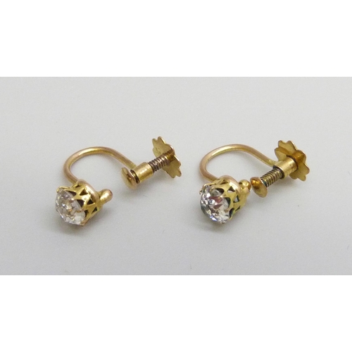 7017 - A pair of 9ct gold and white stone set earrings with screw backs, 0.9g