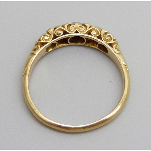 7026 - An 18ct gold ring set with pearls and diamonds, 3.1g, R, lacking one small diamond