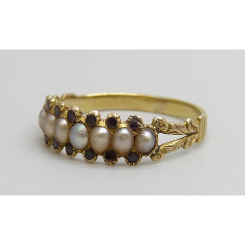 7032 - A c1900 yellow metal, seed pearl and amethyst ring, lacking one amethyst, 1.5g, P