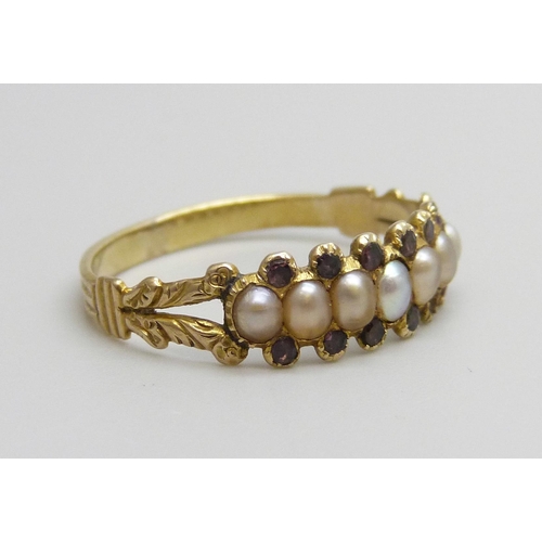 7032 - A c1900 yellow metal, seed pearl and amethyst ring, lacking one amethyst, 1.5g, P