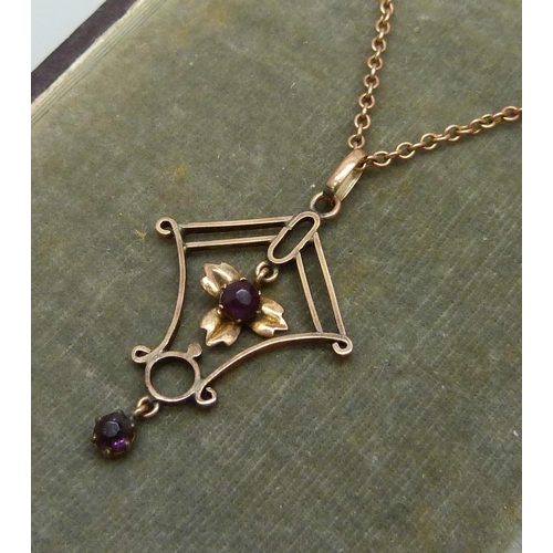 7044 - A 9ct gold pendant on a yellow metal chain, 3.8g, chain 43cm