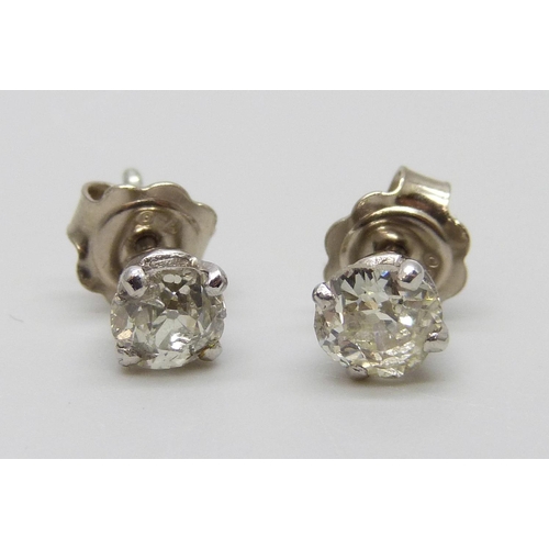 7054 - A pair of hallmarked 18ct white gold diamond stud earrings, total diamond weight 1.31ct