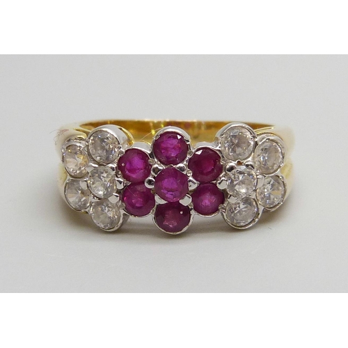 7070 - A 14ct gold, ruby and zircon dress ring, marked 585, 5g, P