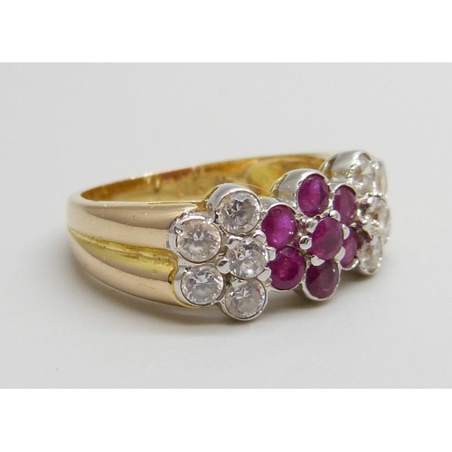 7070 - A 14ct gold, ruby and zircon dress ring, marked 585, 5g, P