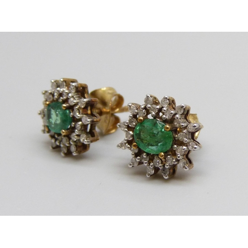 7083 - A pair of 9ct gold, emerald and diamond cluster earrings, 2g, 9mm x 11mm