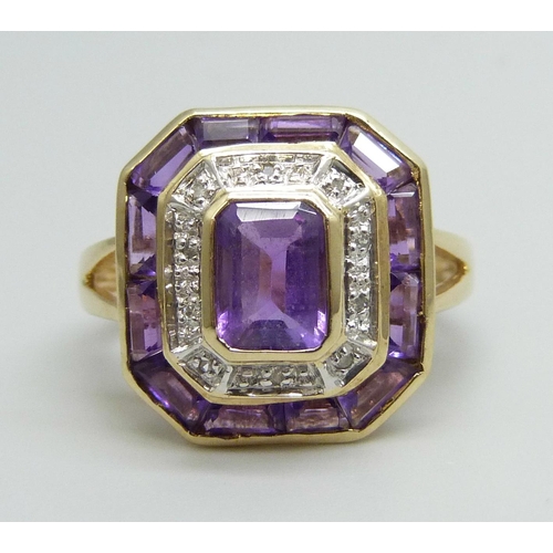 7087 - A 9ct gold Art Deco style amethyst and diamond ring, 3.9g, O