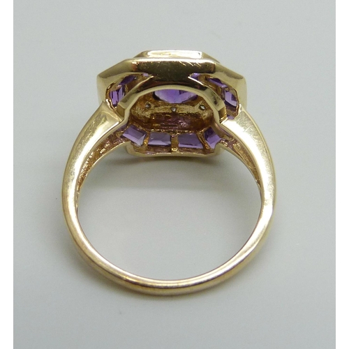 7087 - A 9ct gold Art Deco style amethyst and diamond ring, 3.9g, O