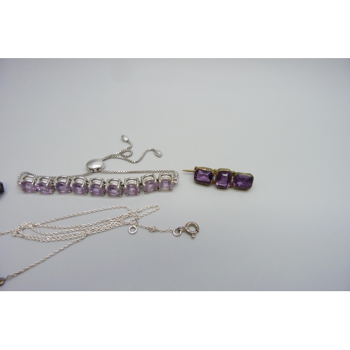 7099 - A collection of amethyst set jewellery including an early 20th Century silver and amethyst drop broo... 