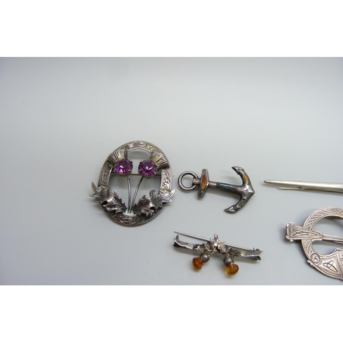 7108 - Six silver brooches including Celtic, and a white metal pin, 43g