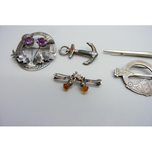 7108 - Six silver brooches including Celtic, and a white metal pin, 43g