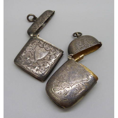 7109 - A silver vesta case, 17g, and a larger silver plated vesta case