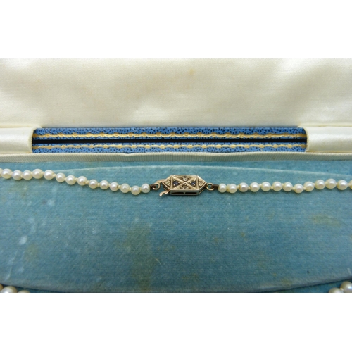 7117 - Two strings of pearls with yellow metal clasps including a  19th Century example, 11g