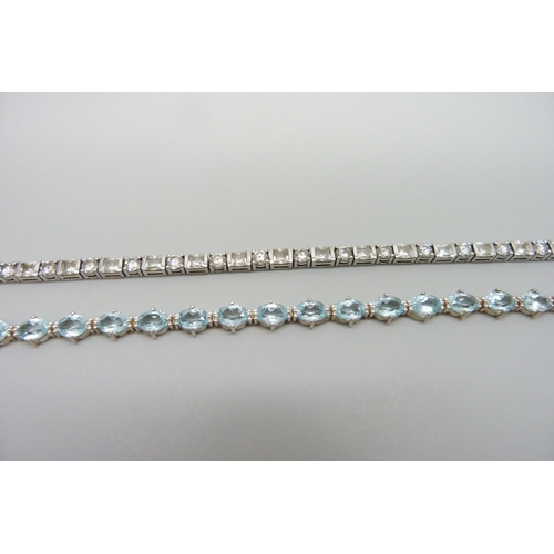 7118 - Two silver stone set tennis bracelets, 29g