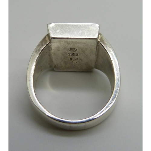 7127 - A Georg Jensen sterling silver gentleman's ring, no. 84, 15.7g, size O/P