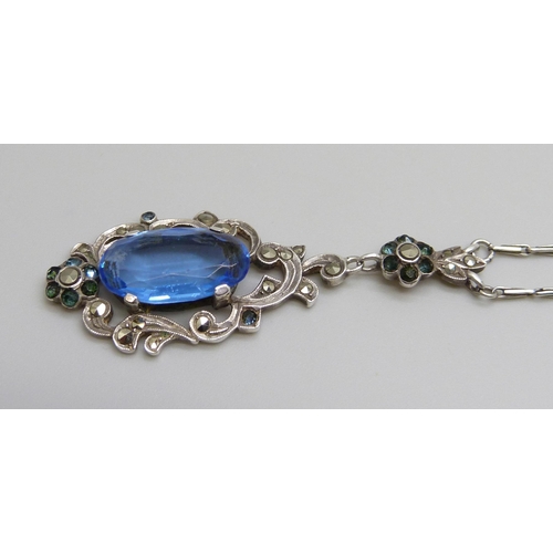 7135 - A silver Art Deco blue stone and marcasite drop pendant necklace, 10g, 5cm drop