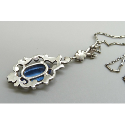 7135 - A silver Art Deco blue stone and marcasite drop pendant necklace, 10g, 5cm drop